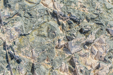 weathered natural pattern of stone surface, close-up
