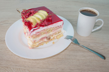 Close up Fruit cake with red currant. Fruit Cake with fresh red currant on the plate