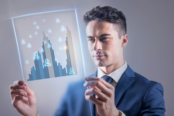 Successful man is working with diagram