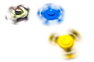 Hand spinner spinning on white background