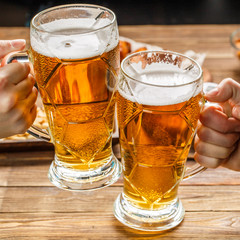 Appetizers and beer on the table for watch the football match.
