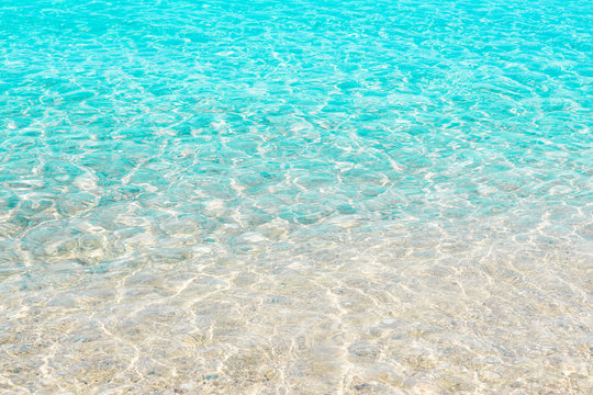 Fototapeta Clear transparent sea water, italian beach in Salento, natural marine background