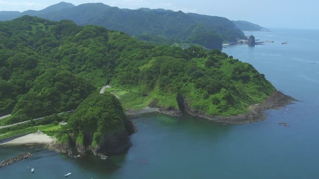 Aerial view of indented coastline.