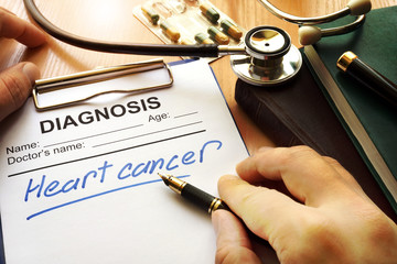 Heart cancer diagnosis on a medical form.