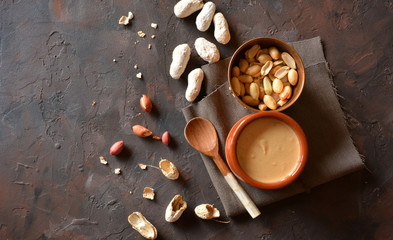 Homemade cream of peanut on table of stone