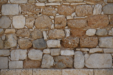 Stone wall texture, Wall made of stone formed in rough block shapes, Textured effect