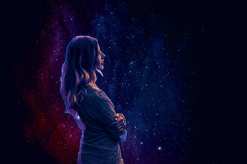 
Silhouette of woman on space background.
