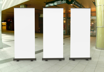 White blank empty high resolution Business Roll Up and  Standee Banner display mock up Template for your Design Presentation. 3d render illustration.