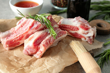 Raw ribs on parchment paper