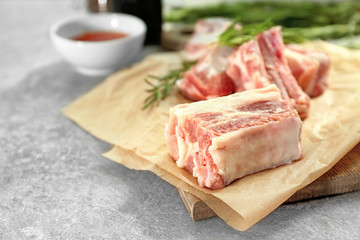 Raw ribs on parchment paper