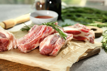 Raw ribs on parchment paper