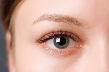 Closeup shot of female eye with day makeup