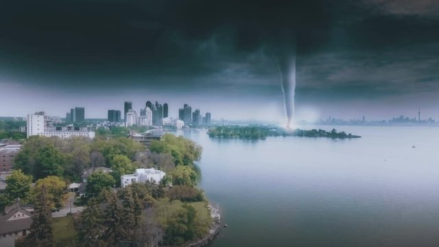 Aerial establishing shot of a large tornado