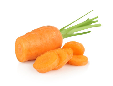 Fresh carrot with slices on white background