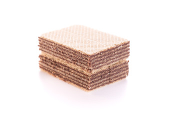 Chocolate wafers on white background.