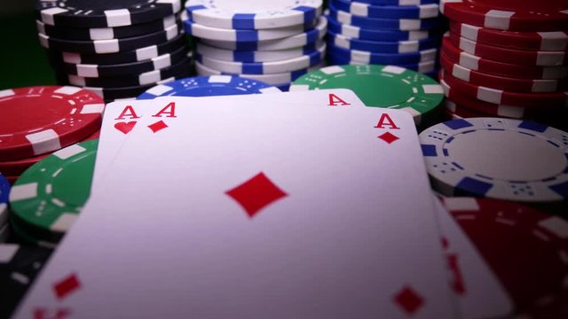 Double Aces On Poker Chips. Poker Table With Chips In Casino