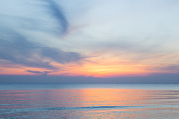 Naklejka na ściany i meble Beautiful sky at sunset on the beach