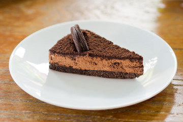 chocolate cake on wooden table background