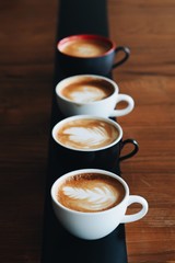 Coffee cup latte art in coffee shop 