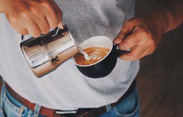 Coffee cup latte art in coffee shop 