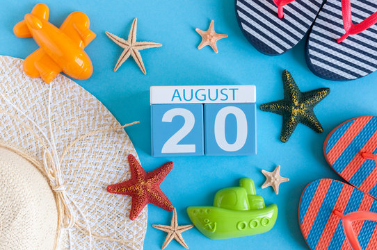 August 20th. Image of August 20 calendar with summer beach accessories and traveler outfit on background. Summer day, Vacation concept
