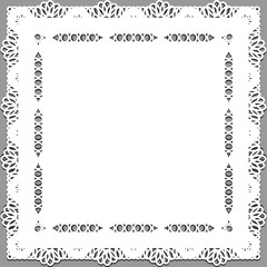 Delicate lace doily on a gray background.