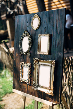 frames for gests list on wooden background