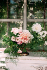 Fototapeta na wymiar Pink peonies and chrysanthemums