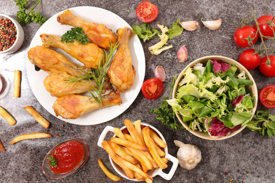 grilled chicken leg with french fries