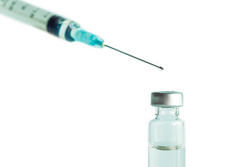 The syringe and needle isolated on white background