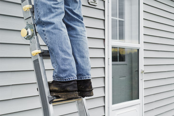 Man Standing On Ladder © Kevin Brine