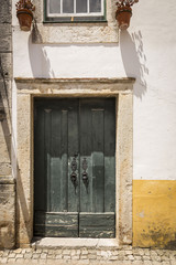 Old door in medieval town of &Oacute;bidos