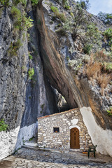 Chapel under rock wall