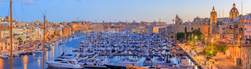View to Grand Harbor from Birgu city in Malta at sunrise
