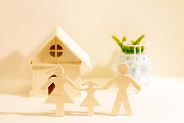 A family and home with model on paper background, for planned in the future concept in retro style.