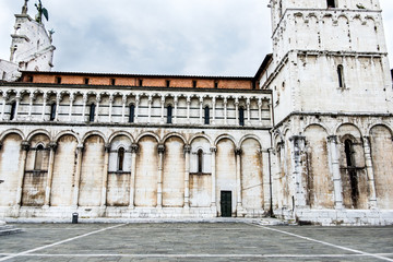Fototapeta na wymiar Side of the church of San Michele in Foro, in Lucca, Italy.