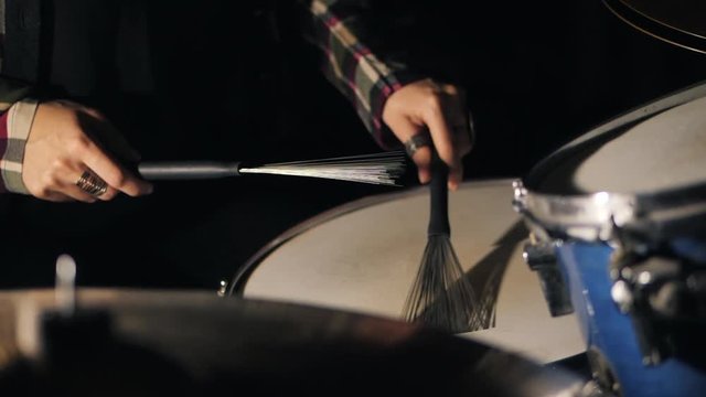Drumming On Snare With Brushes Close Up Slowmotion. footage of two drum sticks hitting a snare drum.