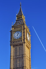 Fototapeta na wymiar Big Ben Tower Plane Houses of Parliament Westminster London England