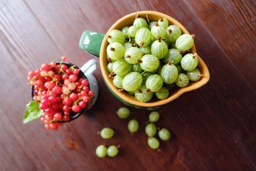 Gooseberries and red currants in a beautiful bowl