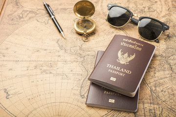 Planning travel concept, Thailand passport on old map