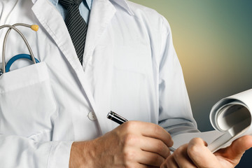 Healthcare And Medicine. Doctor Writes Data Into Medical History