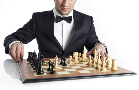 a gentelman playing chess