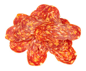 Italian Spianata Piccante salami meat slices isolated on a white background