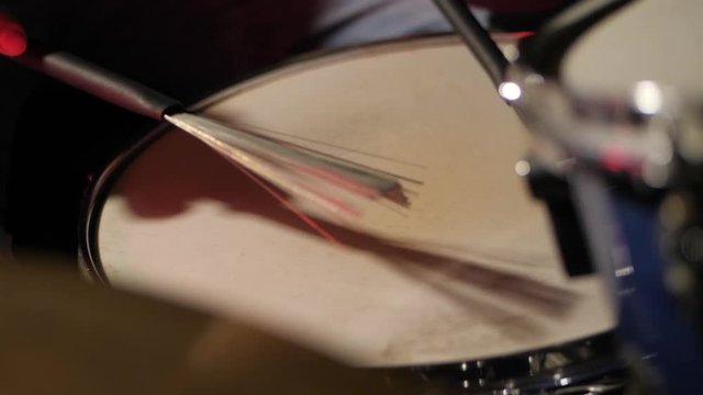 Drumming On Snare With Brushes Close Up Slowmotion. footage of two drum sticks hitting a snare drum.