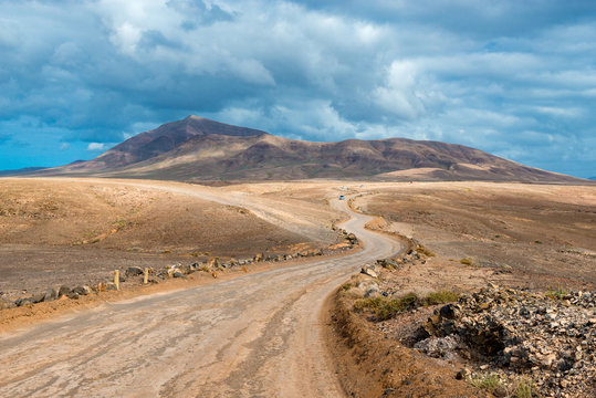 Winding Road in Arid Landscape on Lanzarote, Canary Islands, Spain