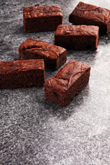 homemade chocolate brownies on grey vintage background, chocolat