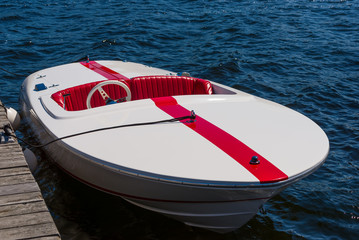 White boat with red trim and red seats