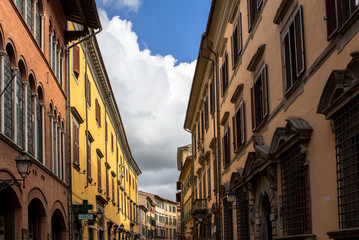 Narrow street in Pisa, Italy