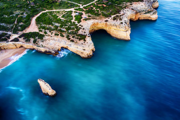 Algarve, Portugal: aerial UAV photo of the coast at sunset
