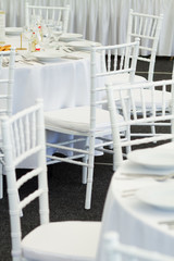 Fototapeta na wymiar detail of white chairs